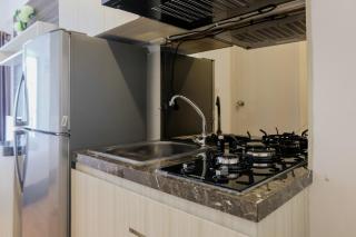 Fully Parquette City View Studio Apartment at M-Town Residence By Travelio - 3