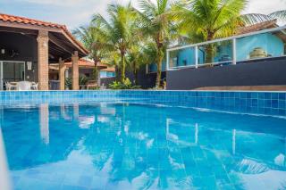 Casa com piscina aquecida, Condomínio a beira mar - Bertioga - 0