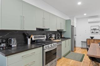 Chic 2BR Top Floor Retreat with Rooftop Near Subway - 8