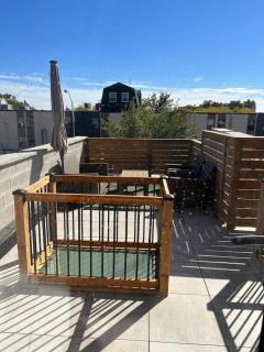 Chic 2BR Top Floor Retreat with Rooftop Near Subway - 6