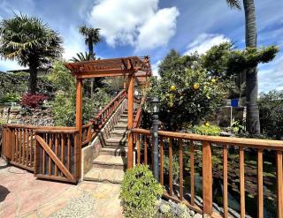 Charming Backyard Guest House with Koi Pond - 0