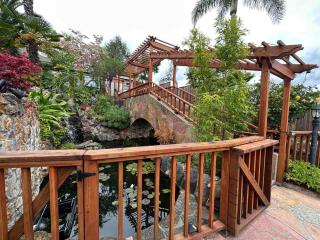 Charming Backyard Guest House with Koi Pond - 7