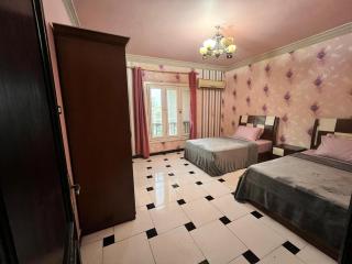 Double Room-Female Only-Garden View-The Queen home - Sheikh Zayed - 0