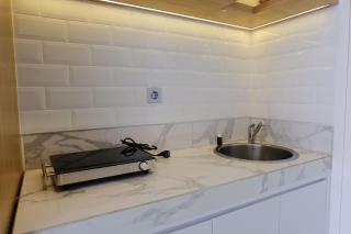 Best Deal Studio Room with Private Jaccuzi at Art Deco Apartment By Travelio - 1