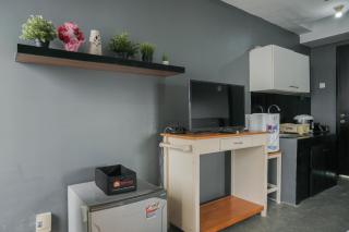 Nice and Warm Studio at Belmont Residence Puri Apartment By Travelio - Jakarta - 7