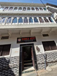Noble Nest Homestay - 9