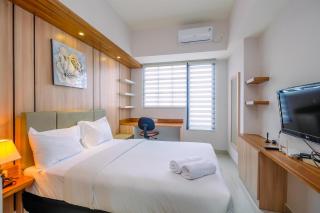 Cozy Living Studio at Evenciio Margonda Apartment near UI By Travelio - 3