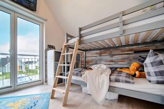 Ferienhaus Boje by Seeblick Ferien ORO, erste Wasserreihe, Kamin, 7Pers - 1