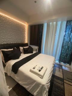 Azure skyview 1BR netflix karaoke ps3 Airport - Manila - 9