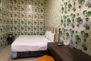 Louise Hotel - Glugur - 7
