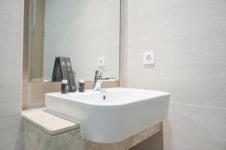 Fancy Designed Studio at Gold Coast Apartment By Travelio - Jakarta - 1
