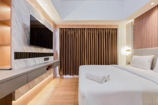 Simply Look and Comfort Studio Room at Casa de Parco Apartment By Travelio - Tangerang - 7