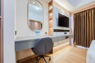 Simply Look and Comfort Studio Room at Casa de Parco Apartment By Travelio - Tangerang - 5