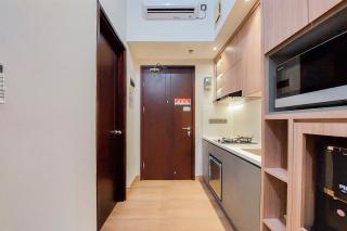 Simply Look and Comfort Studio Room at Casa de Parco Apartment By Travelio - Tangerang - 4