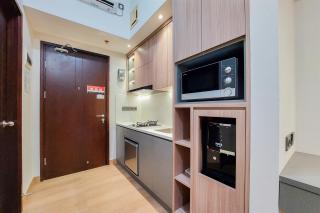 Simply Look and Comfort Studio Room at Casa de Parco Apartment By Travelio - Tangerang - 3