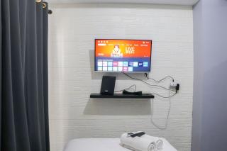 Comfy Studio Apartment at Grand Asia Afrika By Travelio - 1