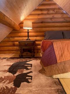 Log lofted rustic cabin in woods - 4