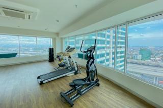 Cozy 1BR without Living Room Grand Kamala Lagoon Apartment By Travelio - Bekasi - 1