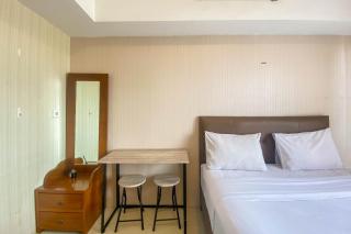 Cozy Stay Studio at Ambassade Kuningan Apartment By Travelio - 8