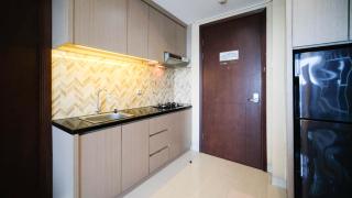 Modern and Cozy 1BR at Grand Sungkono Lagoon Apartment By Travelio - Surabaya - 2