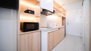 Cozy Studio Connected to Mall at The Vertu Apartment By Travelio - Surabaya - 3