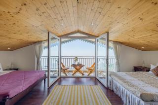 ELIVAAS 3BHK Plus Attic Cliffside Villa with Scenic Views - 1