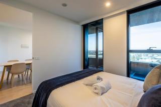 Modern 2BR Abode with Balcony View Gym Access - 2