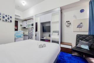 Comfort and Enjoy Living Studio Room at Casa de Parco Apartment By Travelio - Tangerang - 8