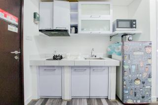 Comfort and Enjoy Living Studio Room at Casa de Parco Apartment By Travelio - Tangerang - 3