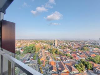 Elegant and Spacious 1BR at Patraland Amarta Apartment By Travelio - Beran-kidul - 1