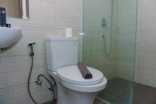 Modern Look 1BR at 22nd Floor Ciputra International Apartment By Travelio - 2