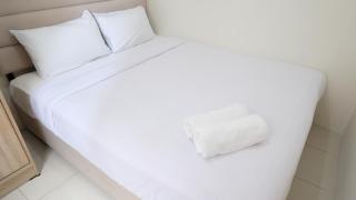 Homey 2BR at Puncak Permai Apartment By Travelio - Surabaya - 9