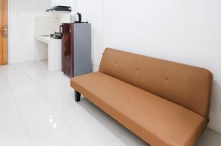 Homey 2BR at Puncak Permai Apartment By Travelio - Surabaya - 8