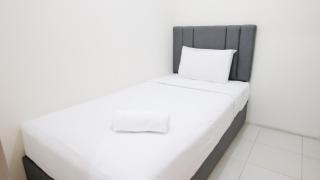 Homey 2BR at Puncak Permai Apartment By Travelio - Surabaya - 5