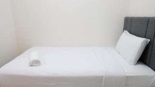 Homey 2BR at Puncak Permai Apartment By Travelio - Surabaya - 4