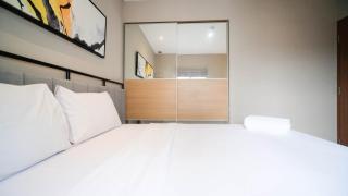 Minimalist and Beautiful 1BR with Extra Room at Pavilion Permata Apartment By Travelio - 6