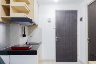 Fully Furnished 1BR with Study Room at Serpong Garden Apartment By Travelio - 1