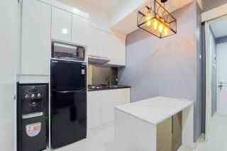 Comfortable and Minimalist 1BR at The Ayoma Apartment By Travelio - Tangerang - 3