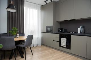 Stylish 2BR Flat with Balcony & Workspace - 4