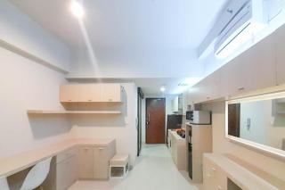 Best Homey and Modern Studio at Uttara The Icon Apartment By Travelio - Kejayan - 5