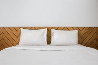 Minimalist and Cozy 1BR Patraland Urbano Apartment By Travelio - Bekasi - 9