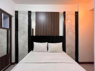 Warm and Cozy 2BR Vida View Makassar Apartment By Travelio - Pampang - 7
