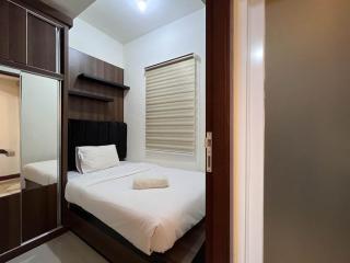 Warm and Cozy 2BR Vida View Makassar Apartment By Travelio - Pampang - 6