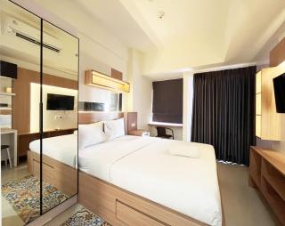 Restful and Simply Look Studio Vida View Makassar Apartment By Travelio - Pampang - 0