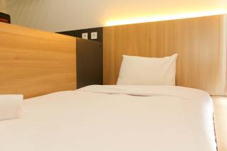 Nice and Cozy Studio at Monroe Tower Apartment By Travelio - Bekasi - 0
