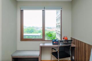 Comfortable Pool View Studio Room at Gateway Park LRT City Bekasi Apartment By Travelio - Bekasi - 1