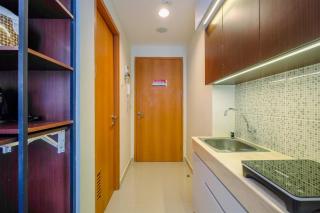 Restful and Tidy Studio at Evenciio Margonda Apartment By Travelio - 6