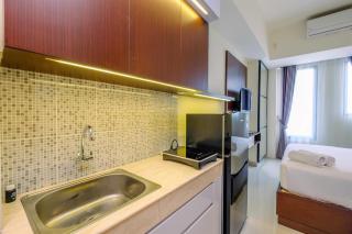 Restful and Tidy Studio at Evenciio Margonda Apartment By Travelio - Depok - 3