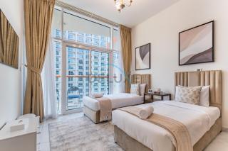 Unbeatable Deal Lovely 2BR with Partial Canal Views by Deluxe Holiday Homes - Sabkhah - 6