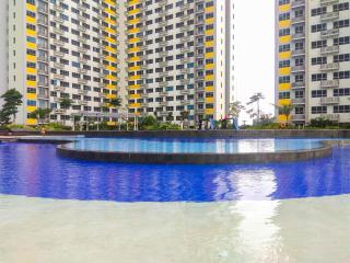Warm and Homey 2BR at Springlake Summarecon Bekasi Apartment By Travelio - Bekasi - 5